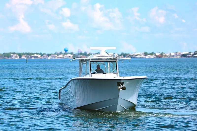 Slide: The Image of 2023 Yellowfin 42 Offshore boat cruising on a sunny day. - 43