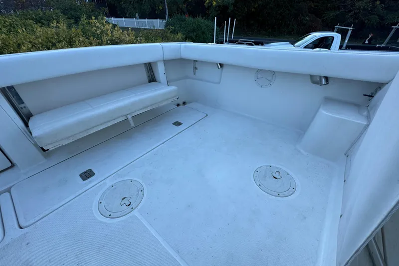 Slide: The Image of 2005 Tiara Yachts 2900 Open deck with seating and storage compartments. - 4