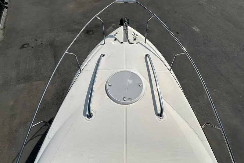 Slide: The Image of 2014 Larson Cabrio 265 boat deck with railing, viewed from above. - 49