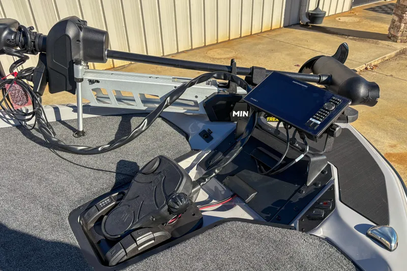 Slide: The Image of 2026 Skeeter ZXR20 SE boat with advanced navigation and control systems. - 11