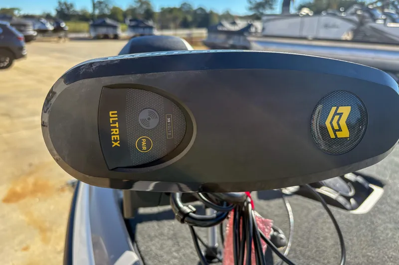 Slide: The Image of Close-up of Ultrex motor on 2026 Skeeter ZXR20 SE boat, showcasing control panel. - 8