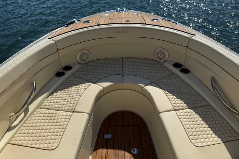 Slide: The Image of Luxurious interior of 2019 Chris-Craft Launch 28 GT boat with elegant seating and wood accents. - 21