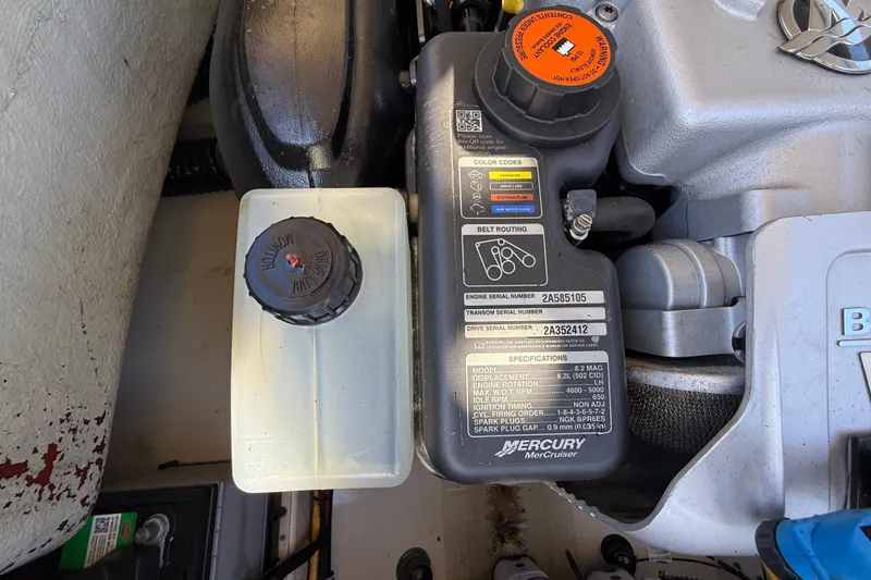 Slide: The Image of Engine compartment of a 2019 Chris-Craft Launch 28 GT with Mercury MerCruiser specifications. - 33