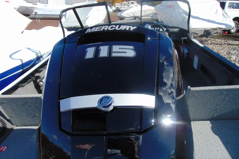 Slide: The Image of 2026 Crestliner 1750 Hawk with Mercury 115 engine, outdoor display. - 5