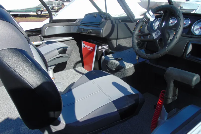 Slide: The Image of Interior of 2026 Crestliner 1750 Hawk boat with steering wheel and seating. - 8