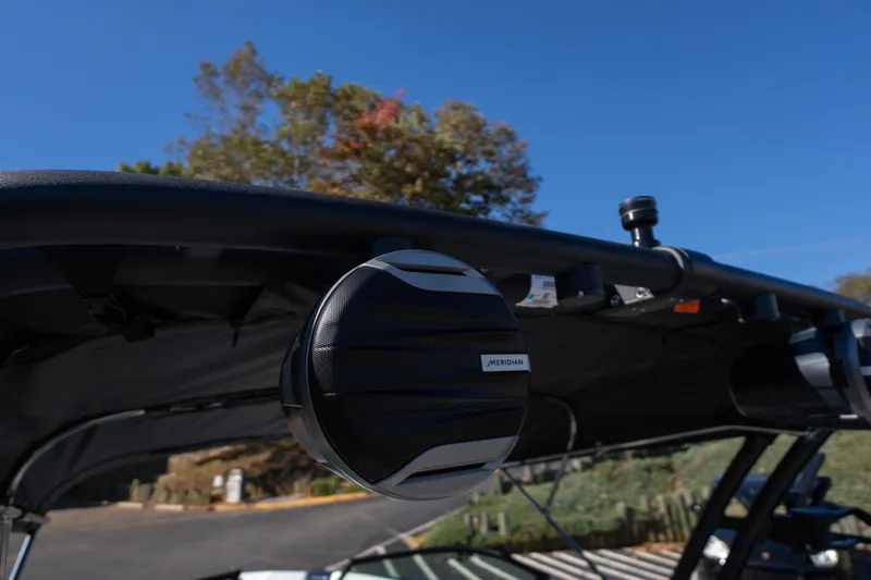 Slide: The Image of 2026 MasterCraft NXT23 boat with Meridian speaker, showcasing sleek design and advanced audio system. - 14