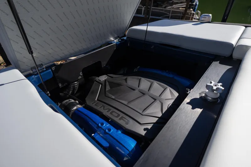 Slide: The Image of 2026 MasterCraft NXT23 engine compartment with Ilmor engine, open hatch view. - 17