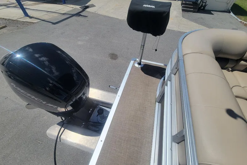 Slide: The Image of 2023 Sun Tracker Party Barge 20 DLX with Mercury outboard motor and beige seating. - 16