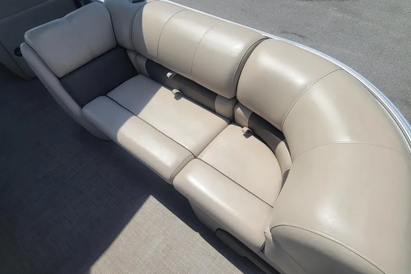 Slide: The Image of 2023 Sun Tracker Party Barge 20 DLX beige seating, spacious and comfortable design. - 8