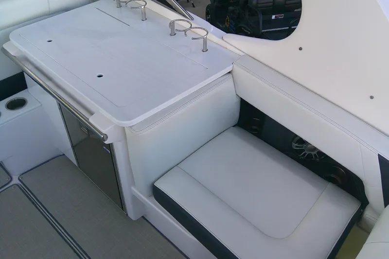 Slide: The Image of 2022 Regal 29 OBX boat interior with seating and storage area. - 13