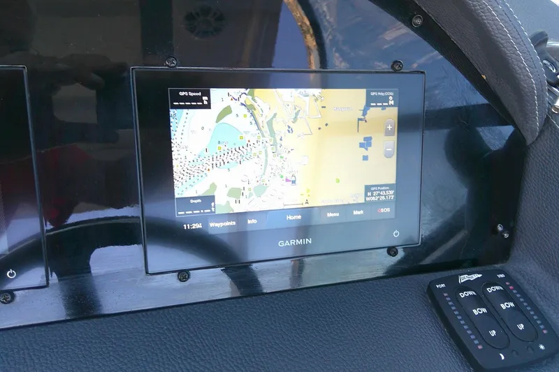 Slide: The Image of Garmin navigation display on 2022 Regal 29 OBX boat dashboard. - 14