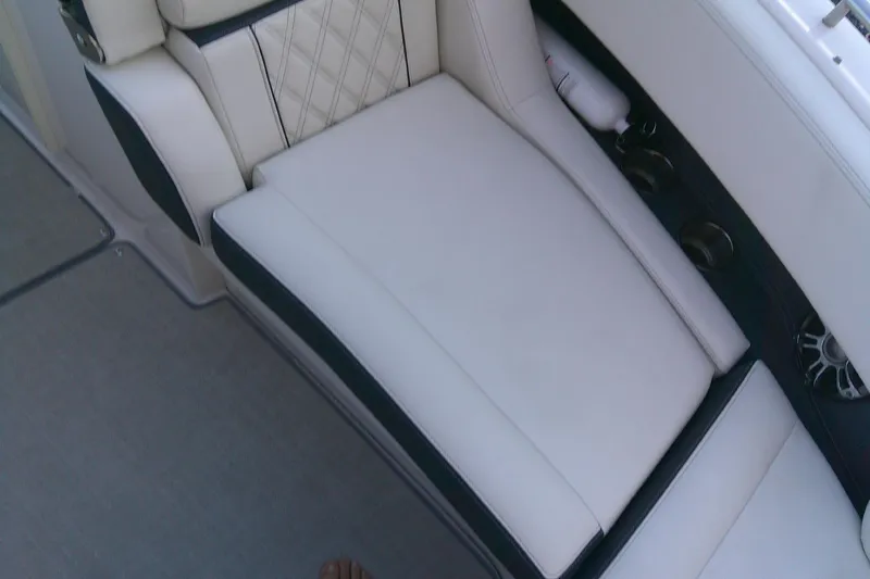 Slide: The Image of Luxurious seating on 2022 Regal 29 OBX boat with elegant upholstery design. - 21