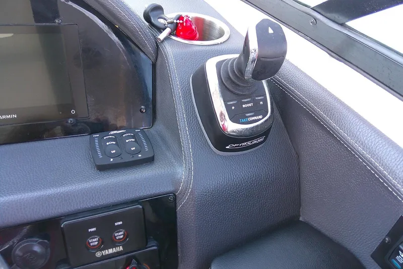 Slide: The Image of Control panel of 2022 Regal 29 OBX boat with joystick and Garmin display. - 27