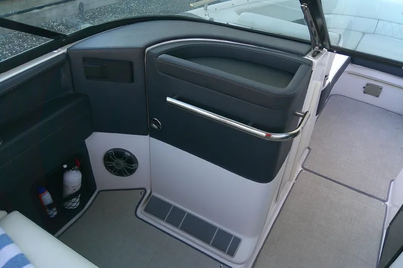 Slide: The Image of 2022 Regal 29 OBX boat interior with sleek design and modern amenities. - 31