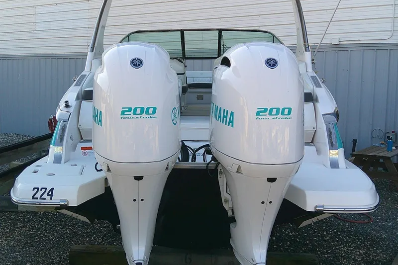 Slide: The Image of 2022 Regal 29 OBX boat with twin Yamaha 200 four-stroke engines. - 9