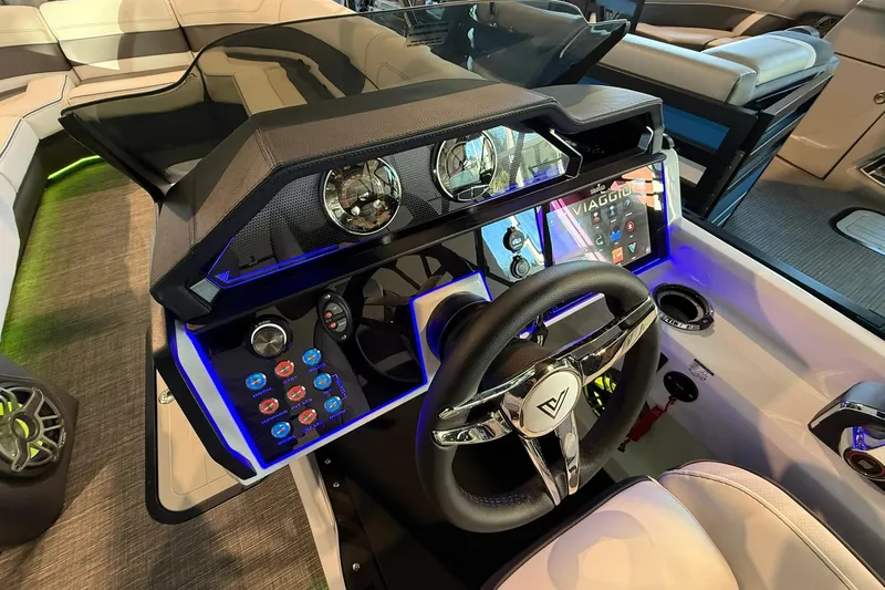Slide: The Image of 2026 Viaggio Diamante Q boat dashboard with modern controls and illuminated display. - 9
