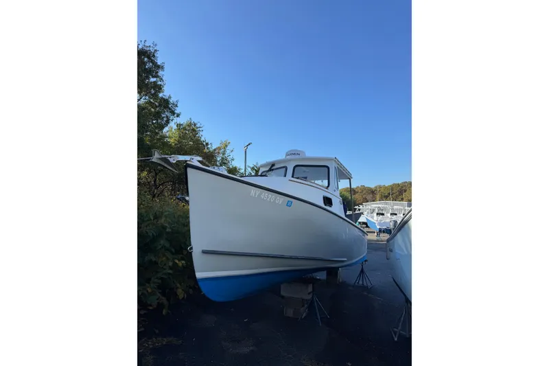 The Image of 2016 Eastern Seaway boat on stands, clear sky background. - 1