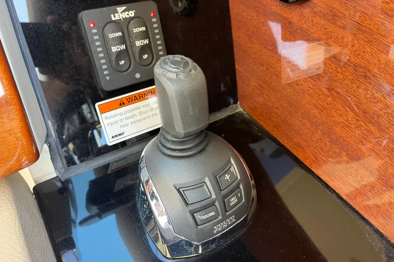 Slide: The Image of Control panel of 2022 Chris-Craft Launch 35 GT I/O with joystick and Lenco trim tab. - 22