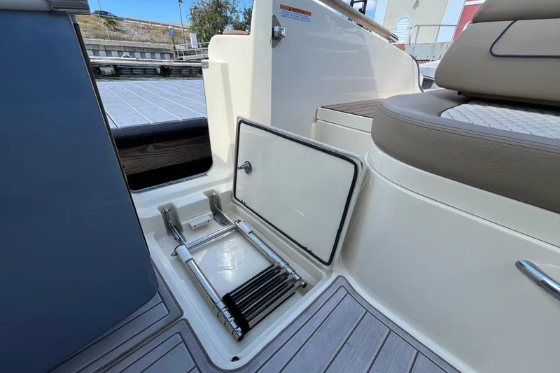 Slide: The Image of 2022 Chris-Craft Launch 35 GT I/O boat with integrated swim ladder storage. - 29