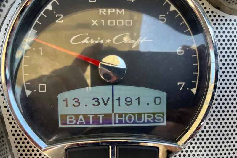 Slide: The Image of Close-up of 2022 Chris-Craft Launch 35 GT I/O tachometer displaying 13.3V and 191.0 hours. - 31