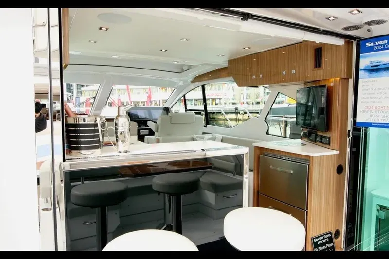 Slide: The Image of Luxurious interior of 2024 Cruisers Yachts 50 Cantius with modern amenities and sleek design. - 13