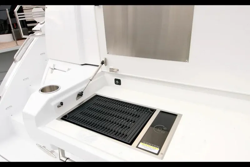 Slide: The Image of Outdoor grill on 2024 Cruisers Yachts 50 Cantius, featuring sleek design and modern amenities. - 6