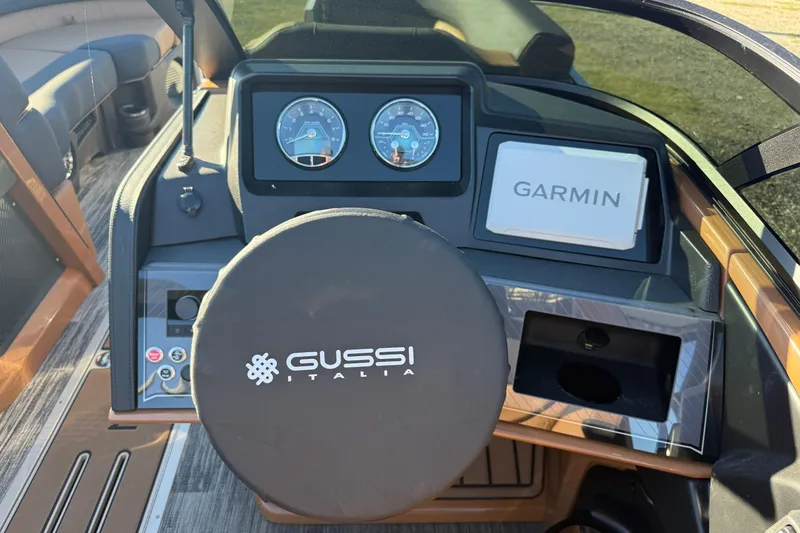 Slide: The Image of 2026 Avalon Catalina Cruise dashboard with Gussi Italia steering and Garmin display. - 11