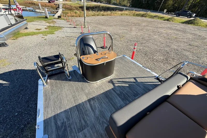 Slide: The Image of 2026 Avalon Catalina Cruise Rear Bench Windshield boat with seating and control console. - 12