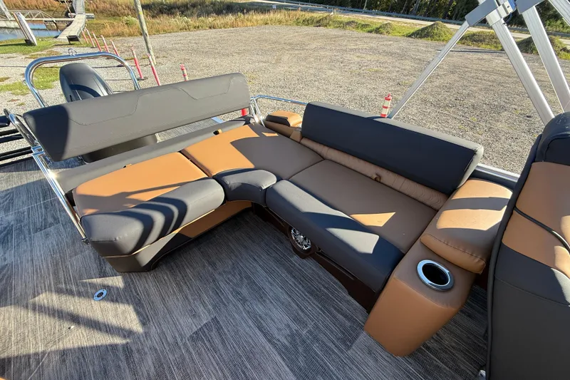 Slide: The Image of 2026 Avalon Catalina Cruise Rear Bench Windshield with stylish seating and cup holders. - 14