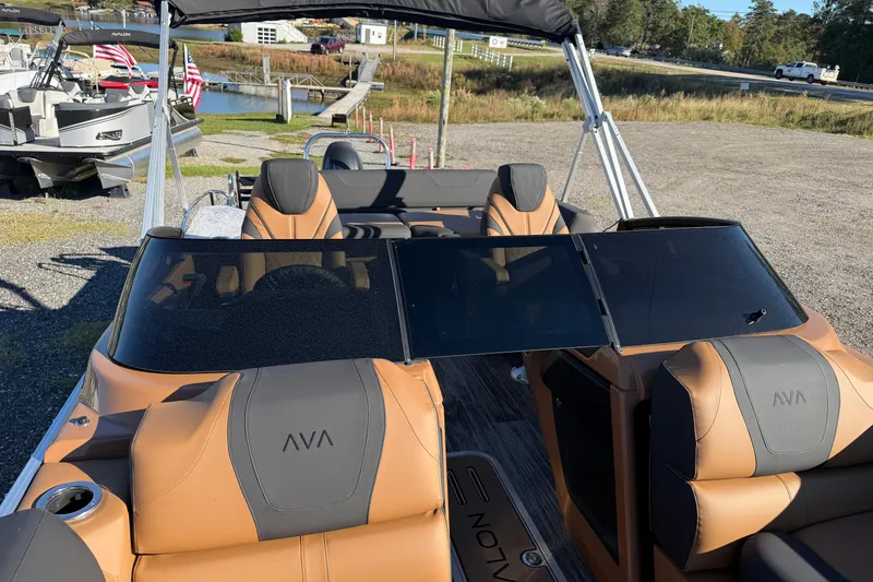 Slide: The Image of 2026 Avalon Catalina Cruise boat with rear bench and windshield, featuring luxurious seating. - 7