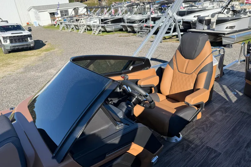 Slide: The Image of 2026 Avalon Catalina Cruise boat with rear bench and windshield, featuring luxurious seating. - 8