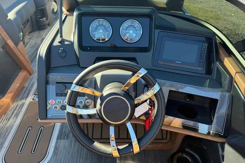 Slide: The Image of Steering wheel and dashboard of 2026 Avalon Catalina Cruise Rear Bench Windshield boat. - 9