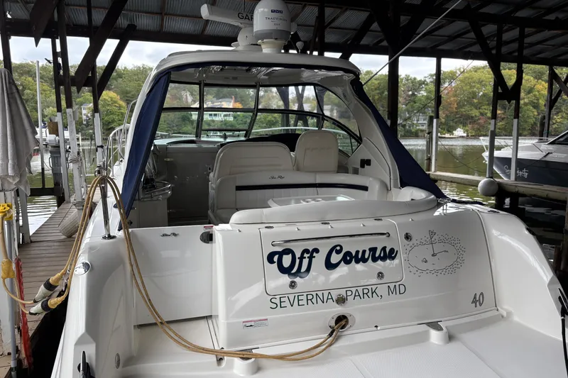 Slide: The Image of 2008 Sea Ray 40 Sundancer docked, named "Off Course," Severna Park, MD. - 2