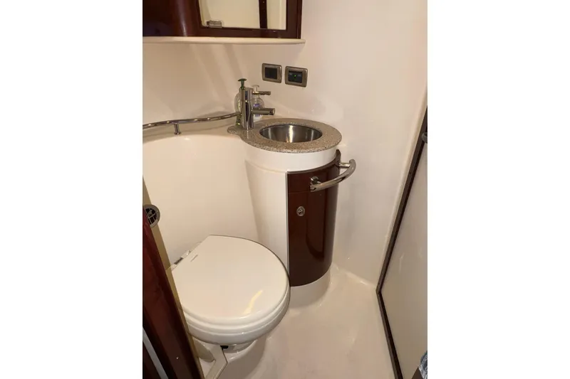 Slide: The Image of Bathroom interior of 2008 Sea Ray 40 Sundancer yacht, featuring toilet and sink. - 20