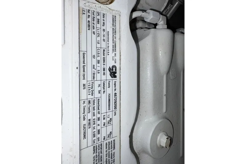 Slide: The Image of Engine specifications label on a 2008 Sea Ray 40 Sundancer boat. - 29