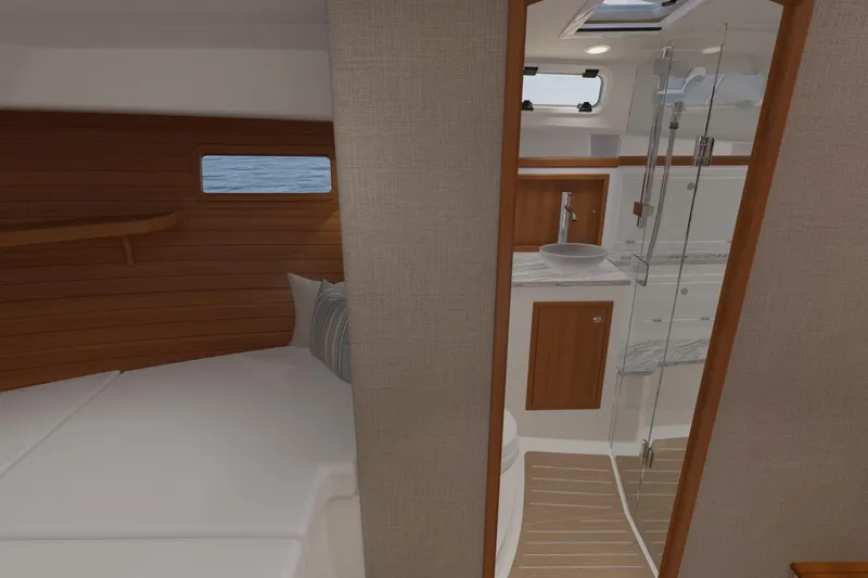 Slide: The Image of Luxurious interior of 2026 MJM 38R yacht featuring cozy cabin and modern bathroom. - 11