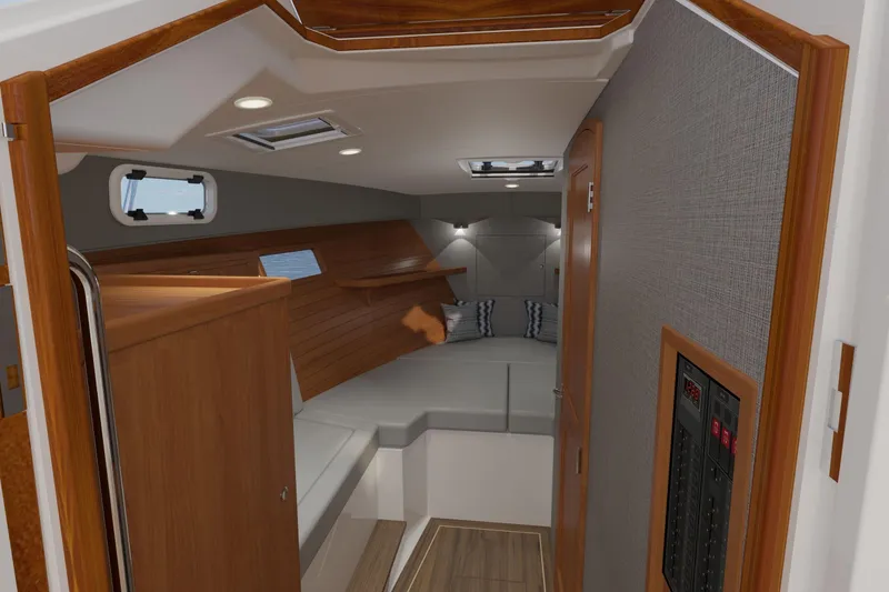 Slide: The Image of Interior of 2026 MJM 38R yacht, featuring modern wood finishes and cozy seating area. - 12