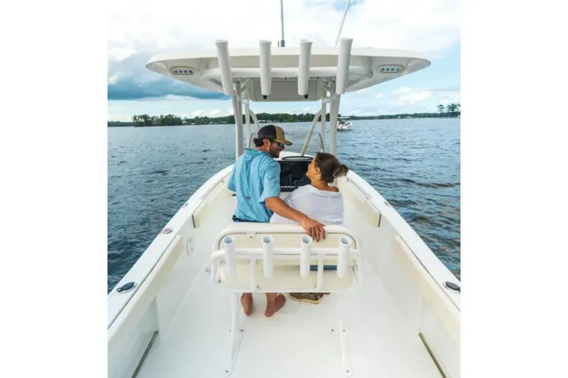 Slide: The Image of Manufacturer Provided Image: Couple enjoying a ride on a 2026 Sea Hunt Ultra 229 boat. - 4