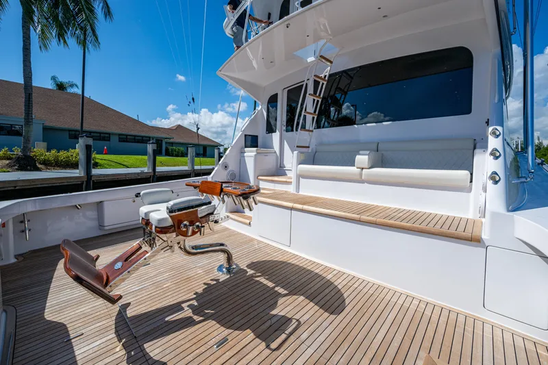 Slide: The Image of 2008 Viking 74 Enclosed Bridge yacht with teak deck and fishing chair. - 11