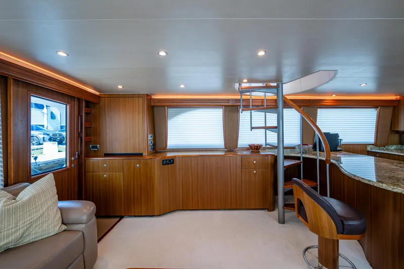 Slide: The Image of Luxurious interior of 2008 Viking 74 Enclosed Bridge yacht with modern wood finishes. - 48