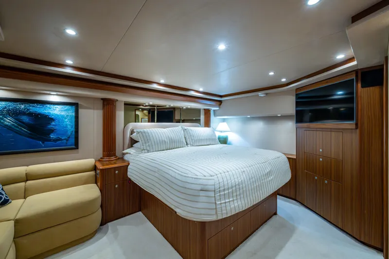 Slide: The Image of Luxurious bedroom interior of 2008 Viking 74 Enclosed Bridge yacht with elegant wood finishes. - 52