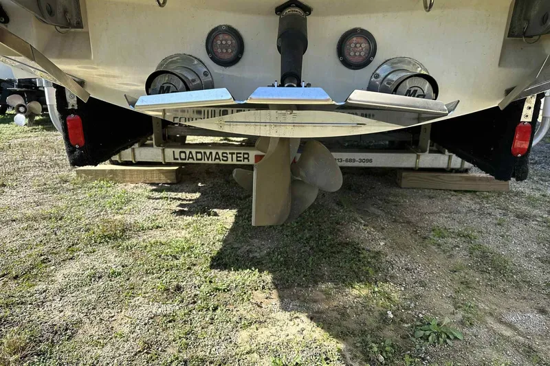 Slide: The Image of Rear view of 2016 MasterCraft X23 boat on Loadmaster trailer. - 16