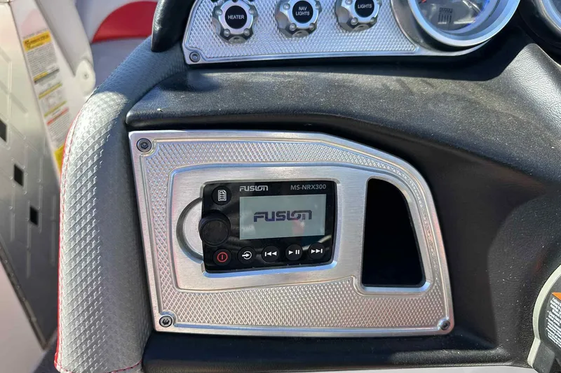 Slide: The Image of 2016 MasterCraft X23 dashboard with Fusion MS-NRX300 audio system. - 22