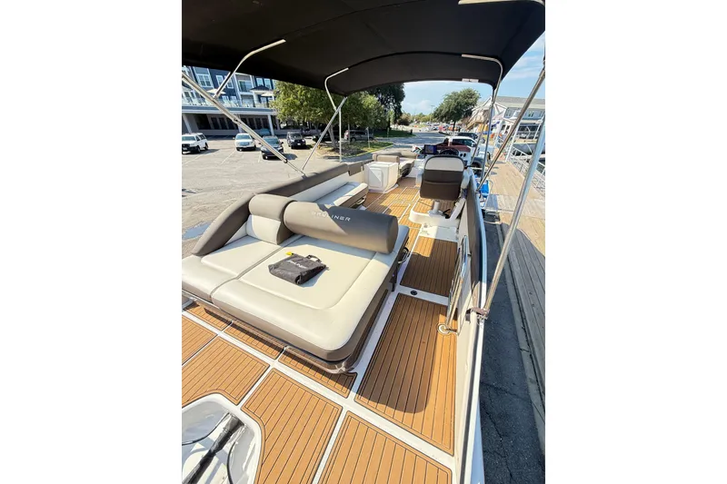 Slide: The Image of 2022 Bayliner Element XR7 boat with spacious seating and sleek design. - 18