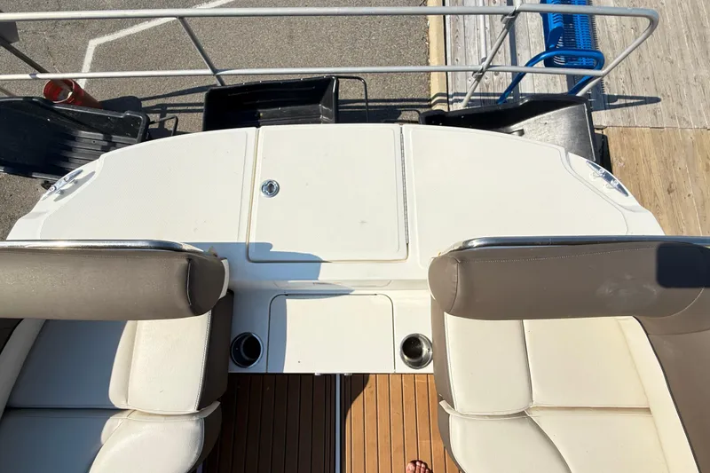 Slide: The Image of 2022 Bayliner Element XR7 boat interior with seating and deck view. - 28