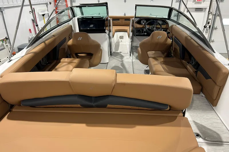 Slide: The Image of 2026 Four Winns HD5 boat ladder compartment with open hatch, showcasing sleek design. - 28