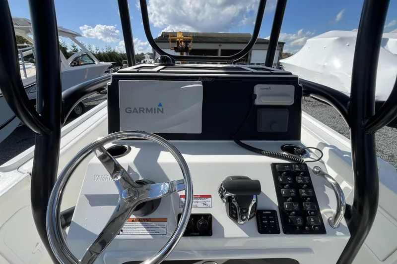 Slide: The Image of 2026 Parker 230 Coastal Elite boat dashboard with Garmin navigation system. - 3