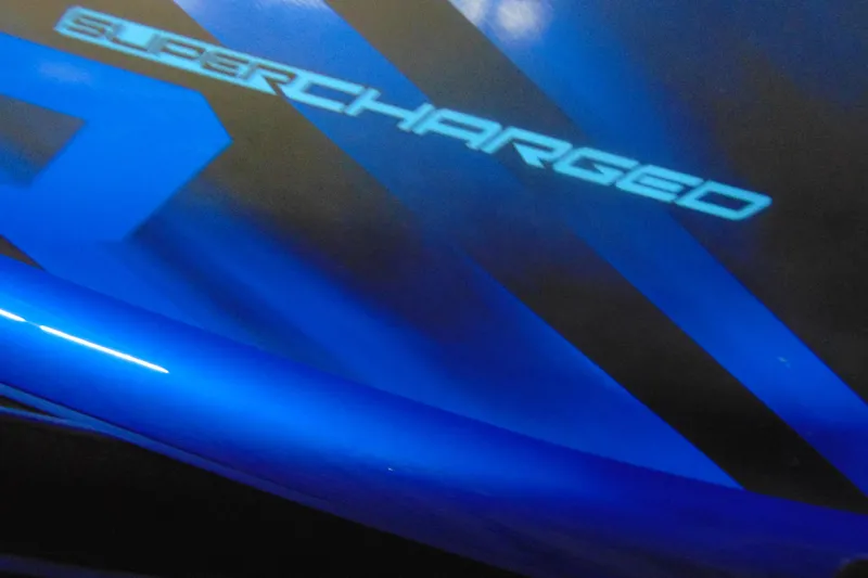 Slide: The Image of 2023 Yamaha WaveRunner GP1800R SVHO with "Supercharged" decal in blue and black design. - 11