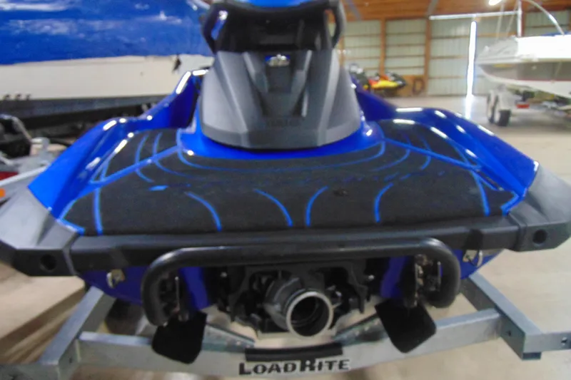 Slide: The Image of 2023 Yamaha WaveRunner GP1800R SVHO in a garage, rear view on trailer. - 12