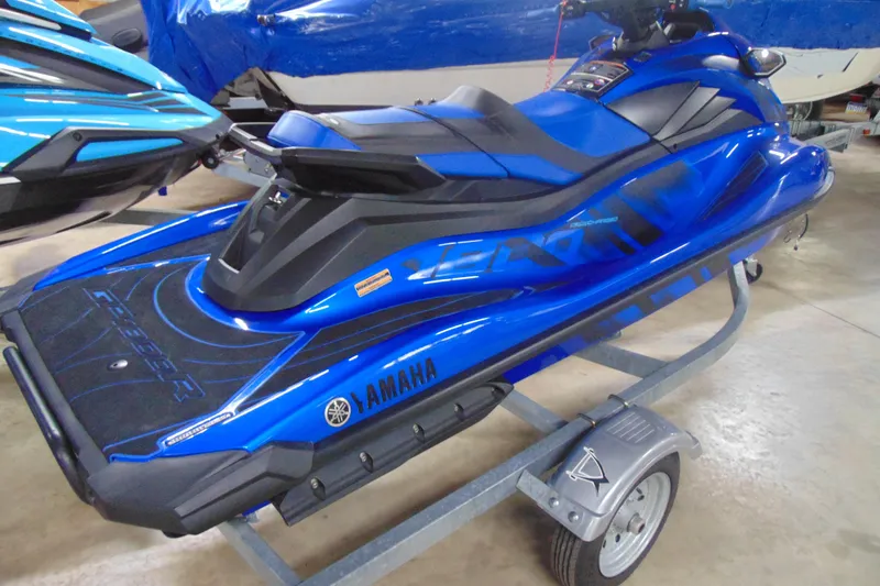 Slide: The Image of 2023 Yamaha WaveRunner GP1800R SVHO in vibrant blue on a trailer. - 4